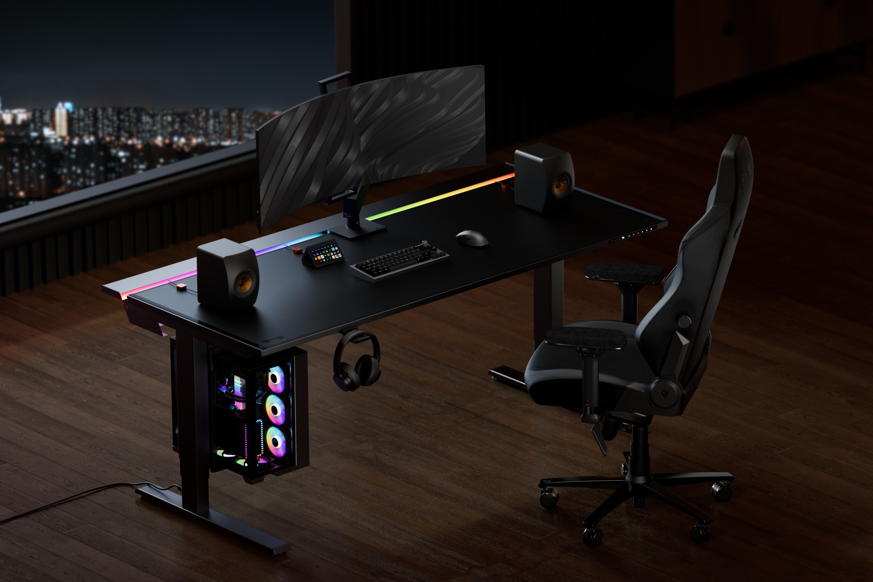 A wide desk setup featuring a curved ultrawide monitor, RGB-lit desk edge, keyboard, mouse, speakers, and a gaming chair in a dark room