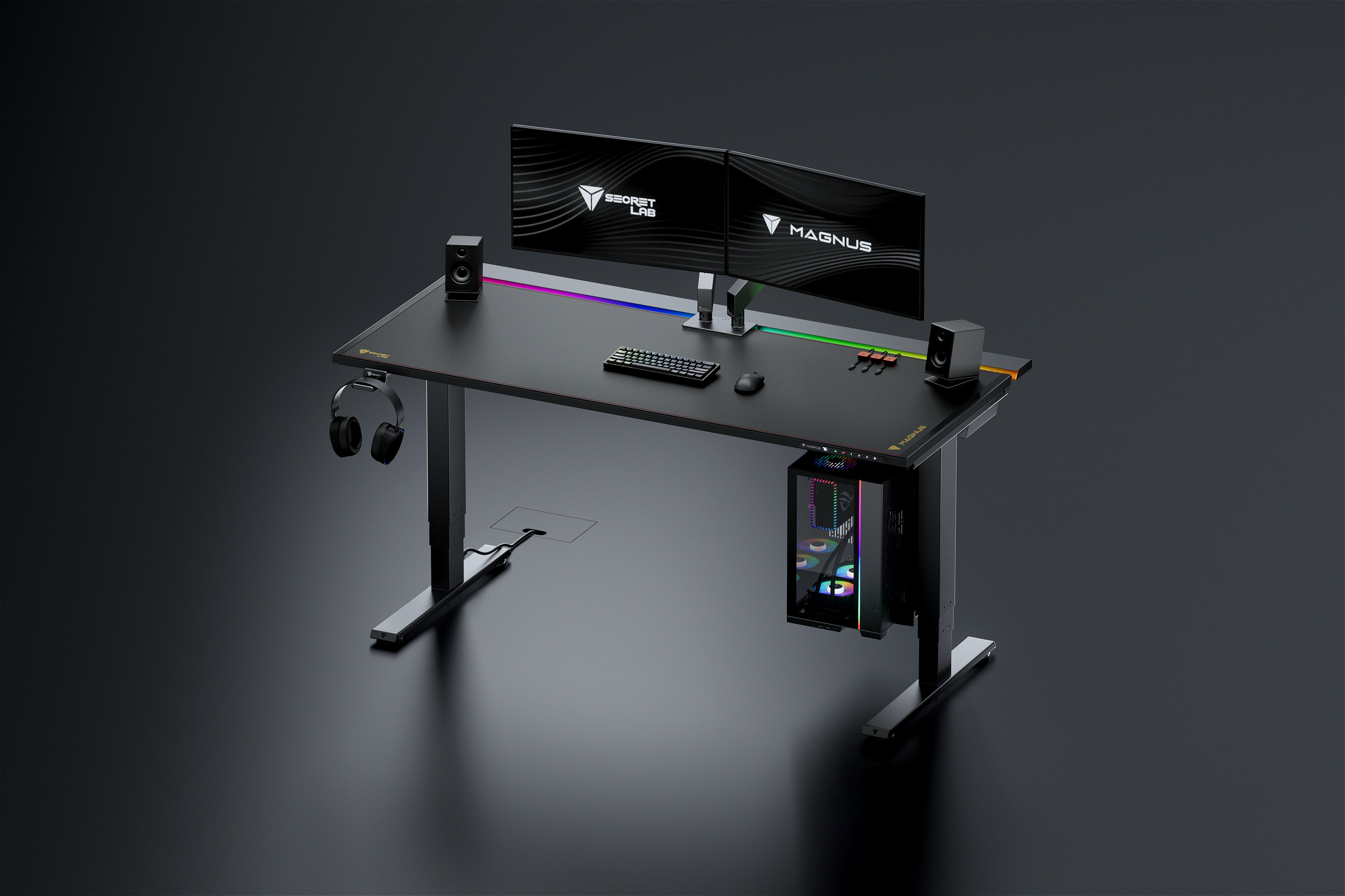 Secretlab Magnus Pro desk with RGB lighting strip, headphone hanger and a PC mounted below the desktop