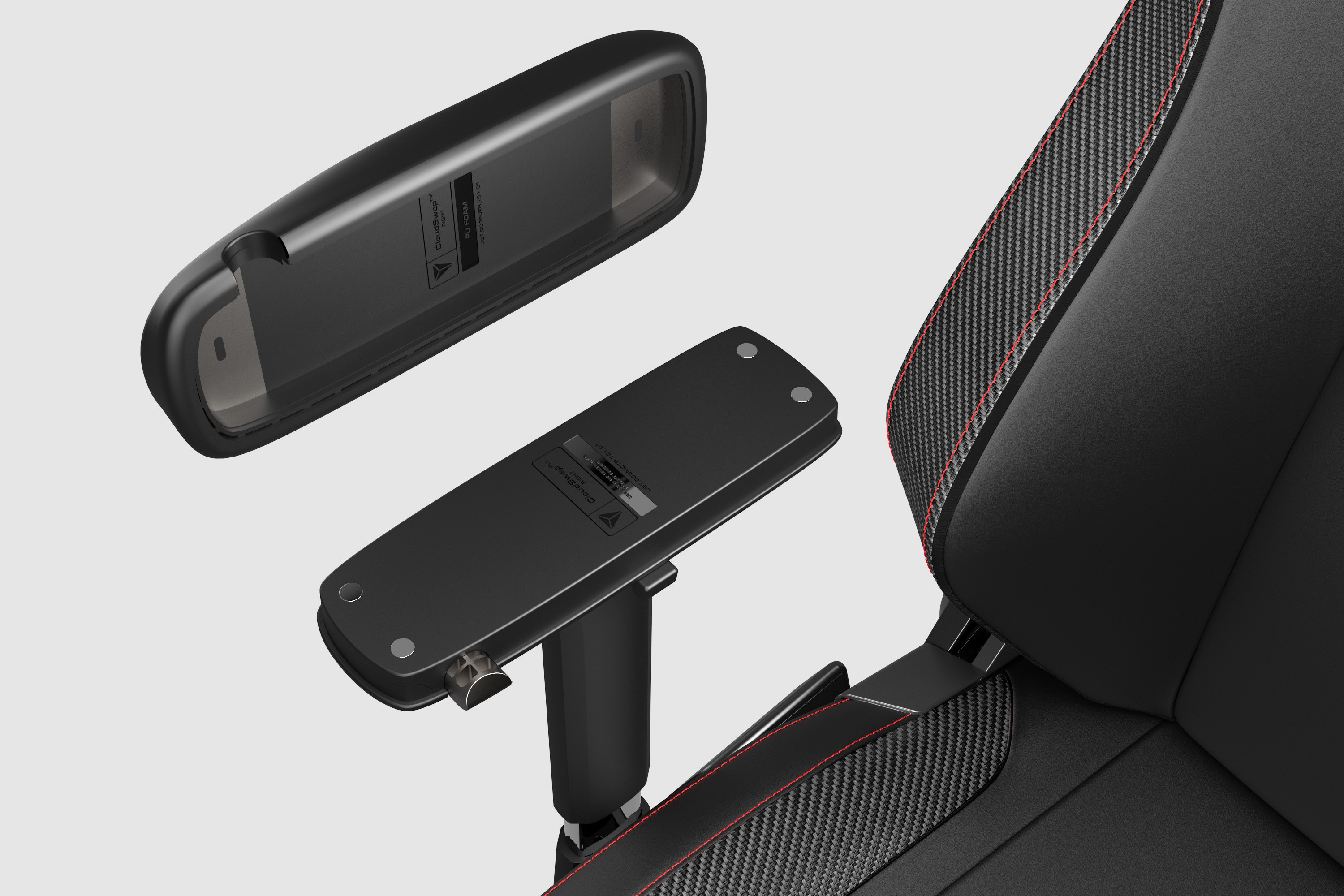Pair of Secretlab Titan Evo CloudSwap magnetic armrest tops being removed