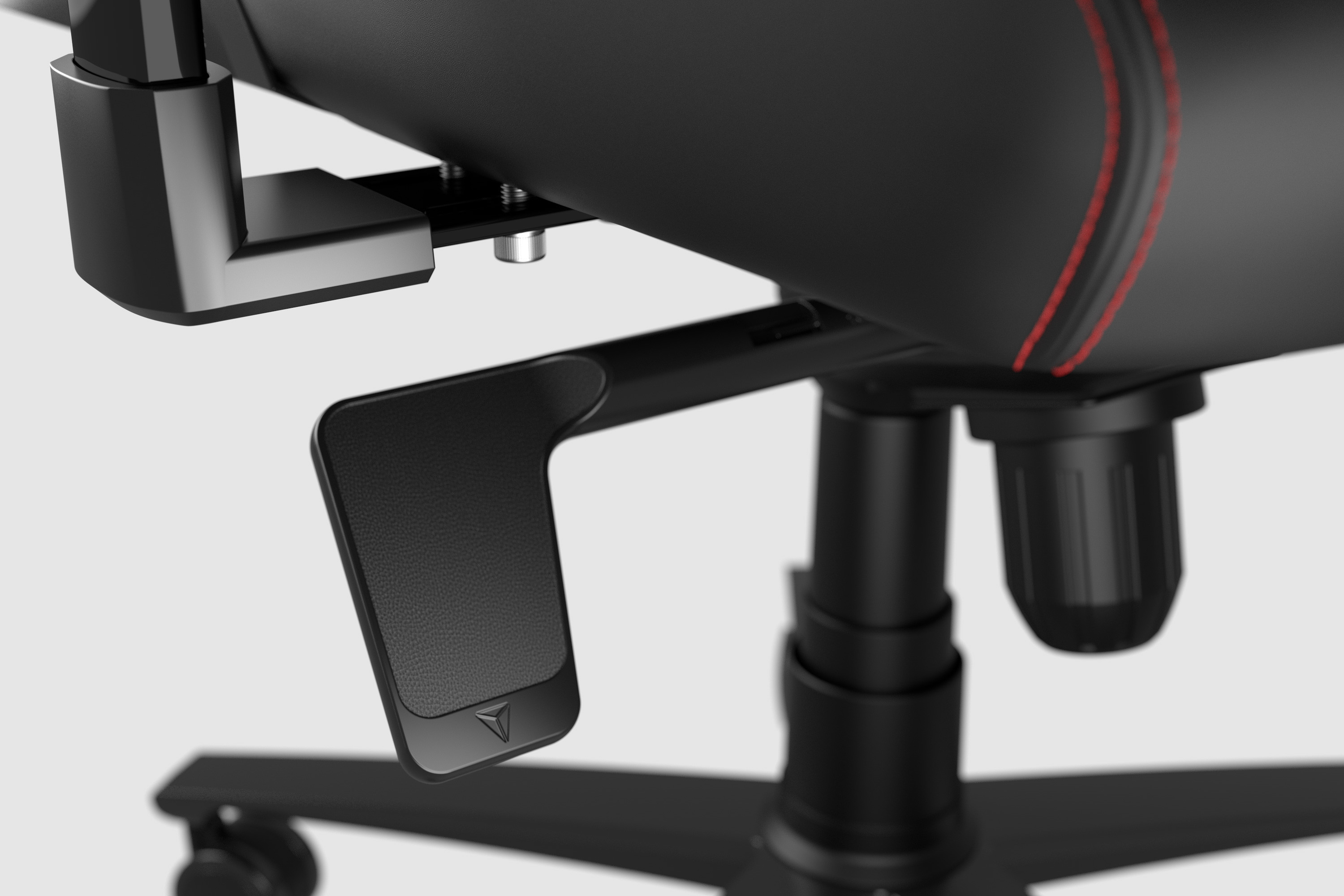 Underside of the Secretlab Titan Evo seat showing the gas lift, mechanism and aluminum base with caster